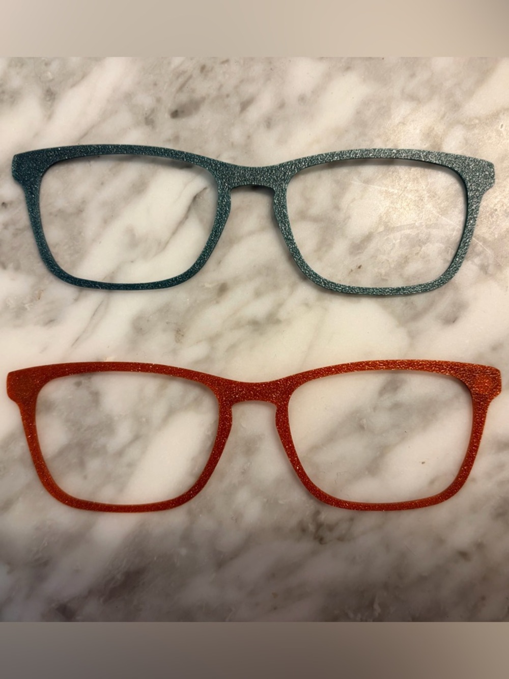 Pair of 3D printed glitter toppers for Casper